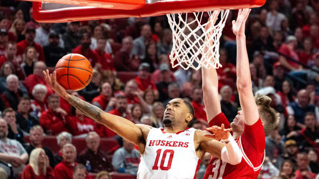 Feb 1, 2024; Lincoln, Nebraska, USA; Nebraska Cornhuskers guard Jamarques Lawrence (10) shoots the ball against Wisconsin Badgers forward Nolan Winter (31) during the first half at Pinnacle Bank Arena.
